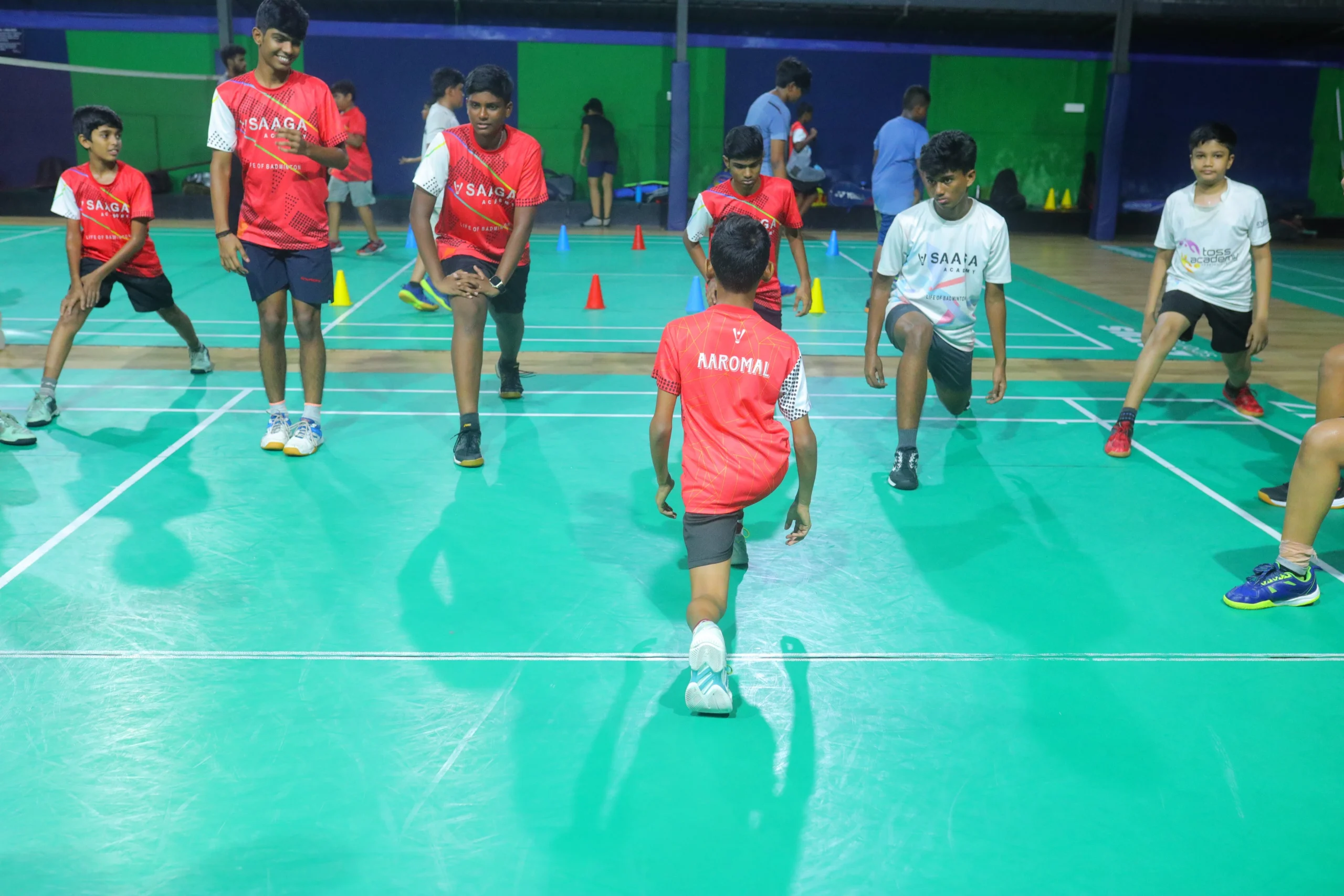 Saaga Badminton Academy players training together